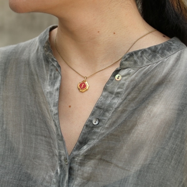 YVES SAINT LAURENT イヴ・サンローラン カサンドラ ロゴ ネックレス 中古